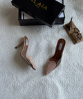 Alaïa Plexi and Patent Leather Mules (Nude / Clear)