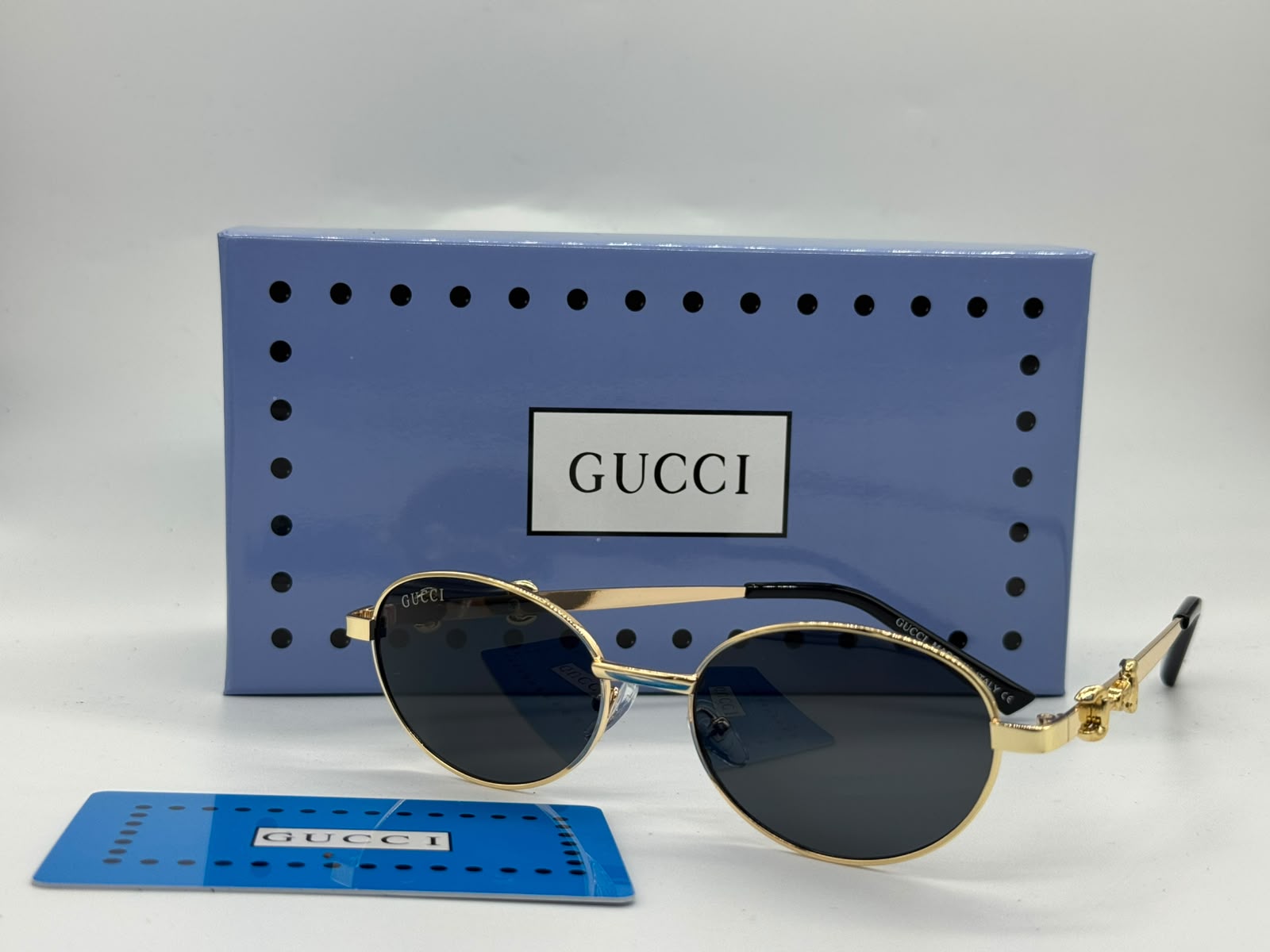 Gucci Charm Detail Round Sunglasses (Gold / Dark Grey)