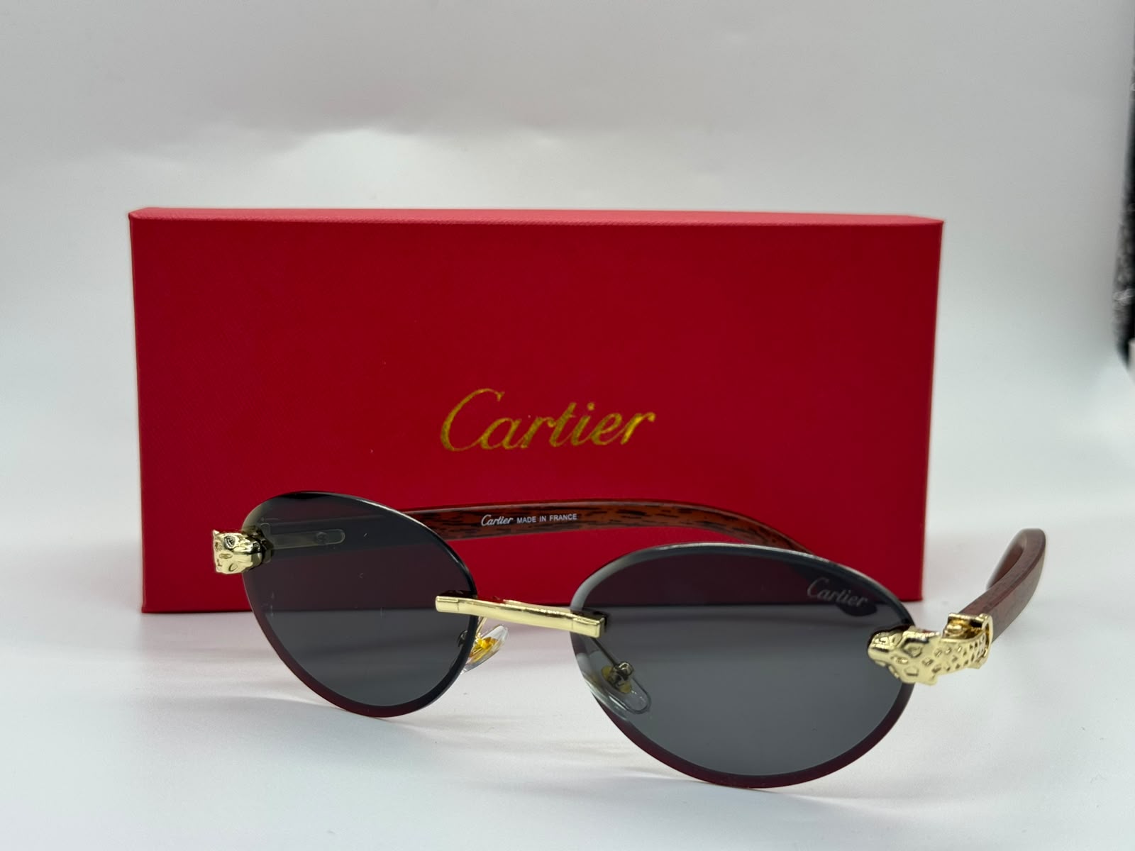 Cartier Panthère de Cartier Rimless Sunglasses (Gold / Dark Grey)