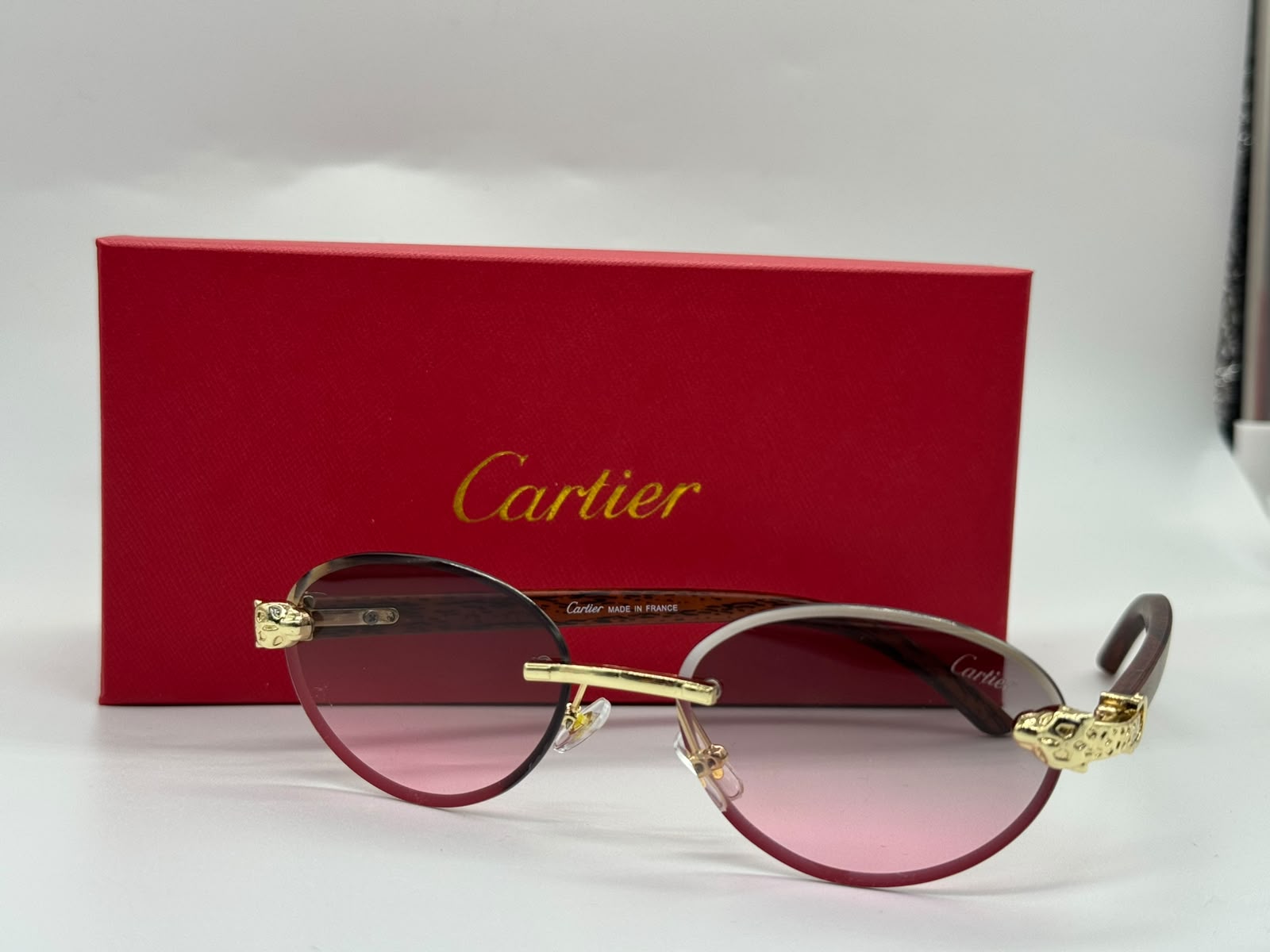 Cartier Panthère de Cartier Rimless Sunglasses (Gold / Pink Gradient)