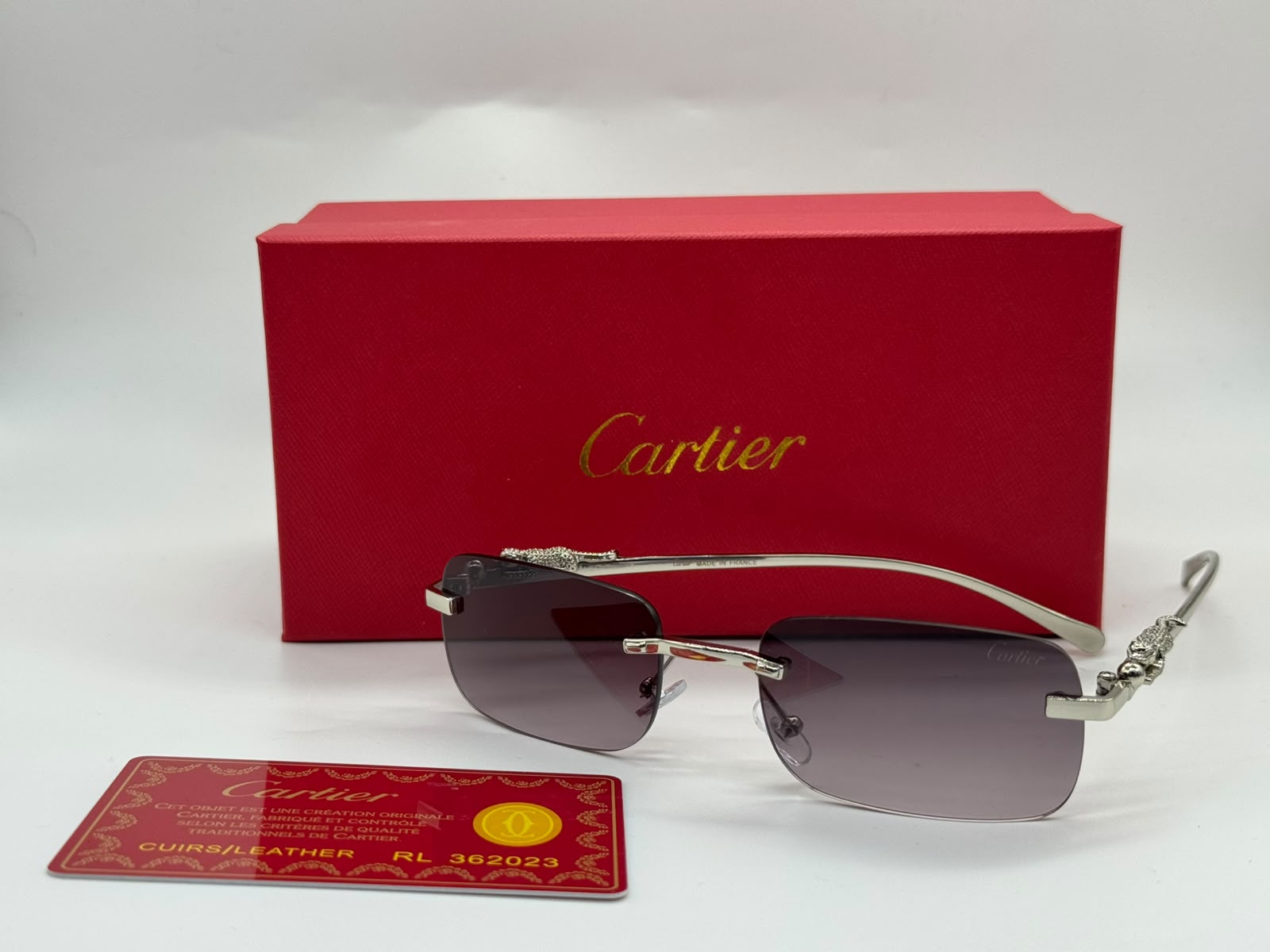 Cartier Panthère de Cartier Rimless Rectangular Sunglasses (Silver / Grey Gradient)