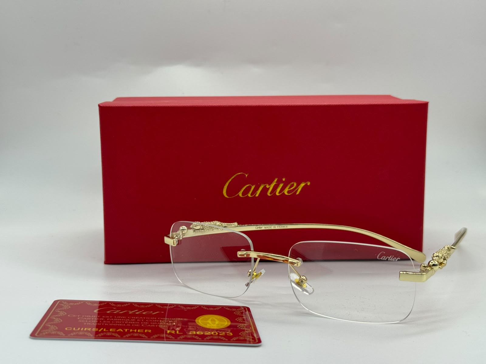 Panthère de Cartier Rimless Rectangular Glasses (Gold / Clear)
