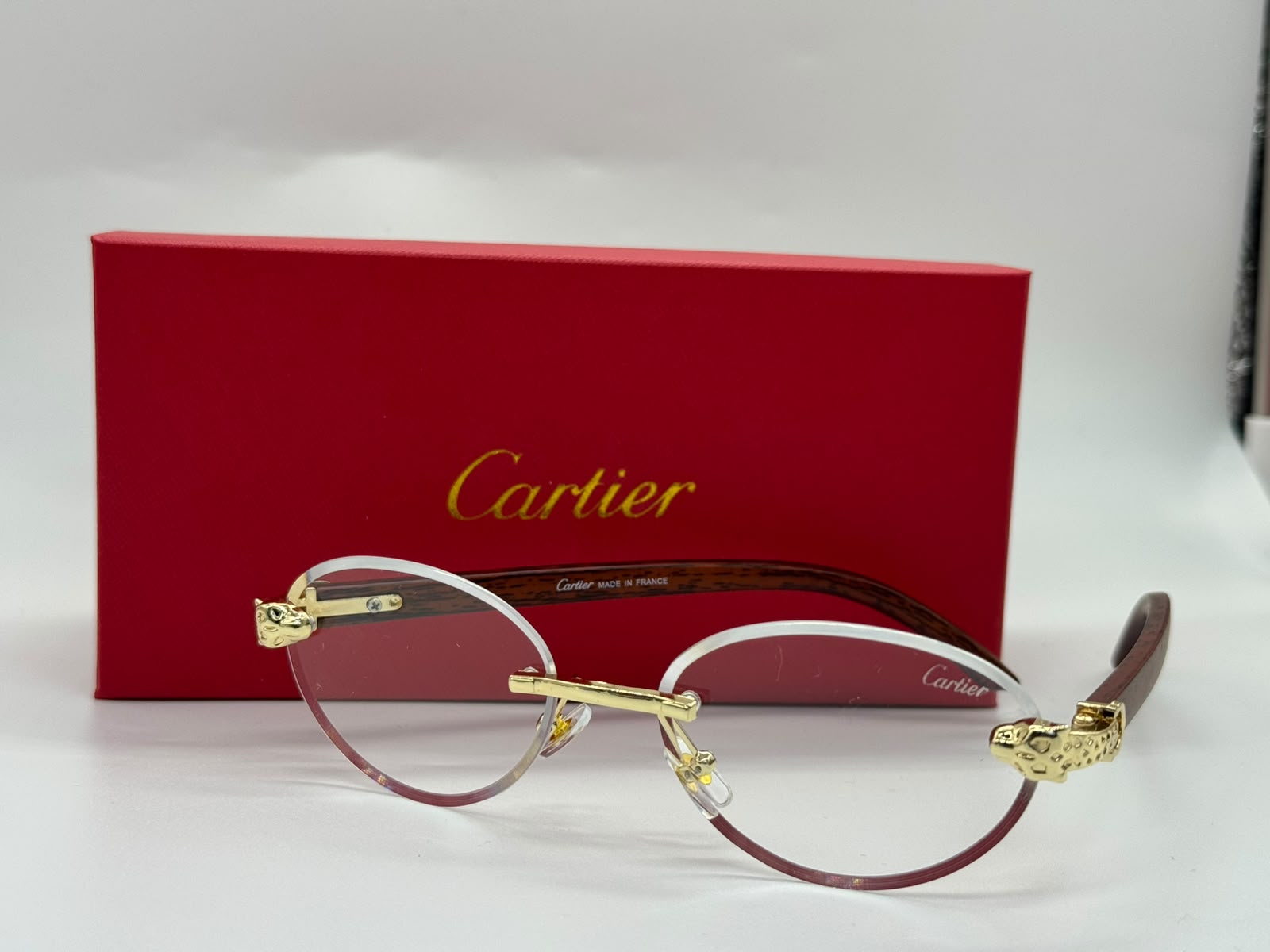 Cartier Panthère de Cartier Rimless Glasses (Gold / Clear with Burgundy Bevel)