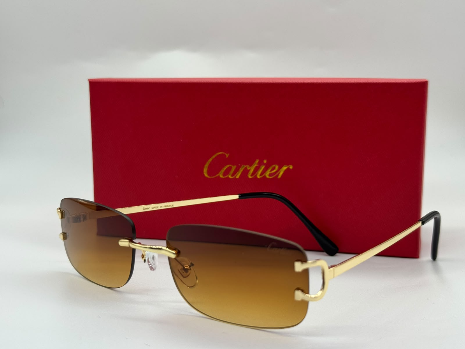 Cartier Signature C de Cartier Rimless Sunglasses (Gold / Brown Gradient)
