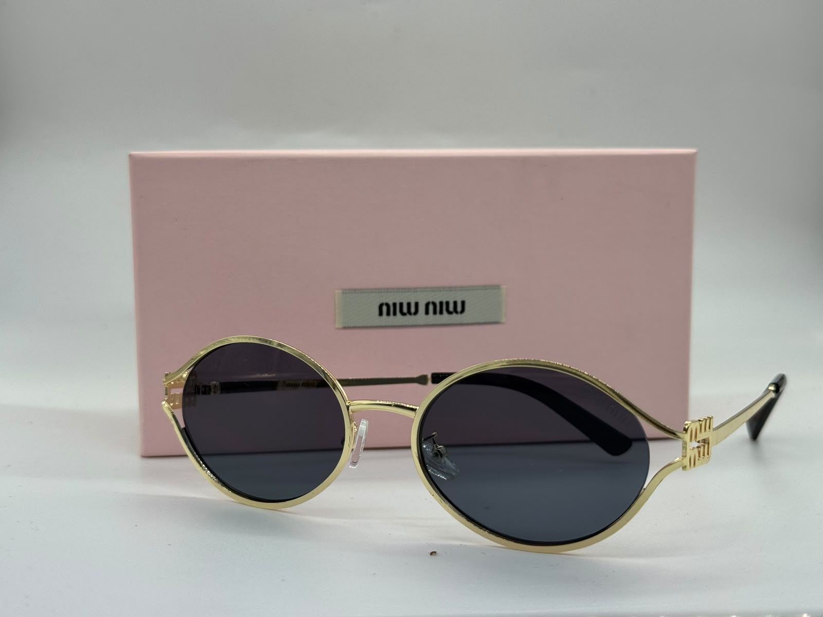 Miu Miu Logo Round Sunglasses (Pale Gold / Dark Grey)