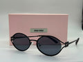 Miu Miu Logo Round Sunglasses (Matte Black / Dark Grey)