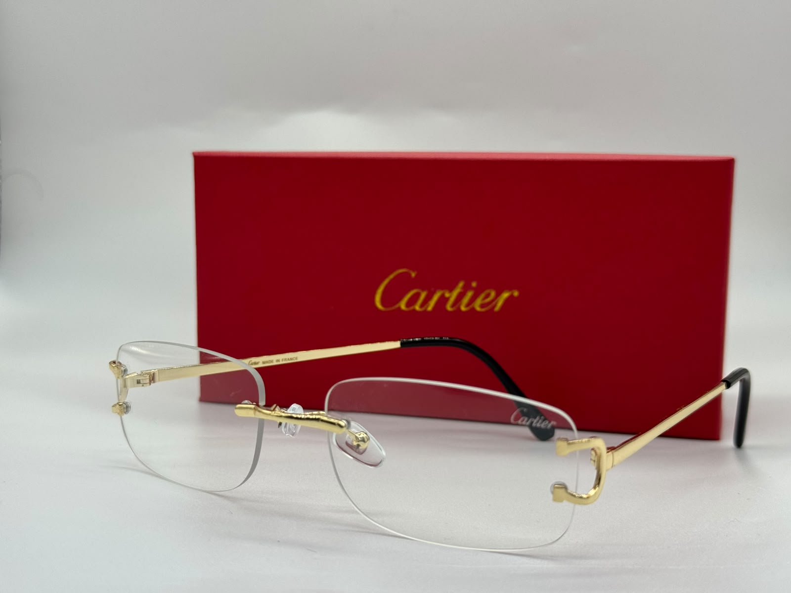 Cartier C de Cartier Rimless Eyeglasses (Gold and Clear)
