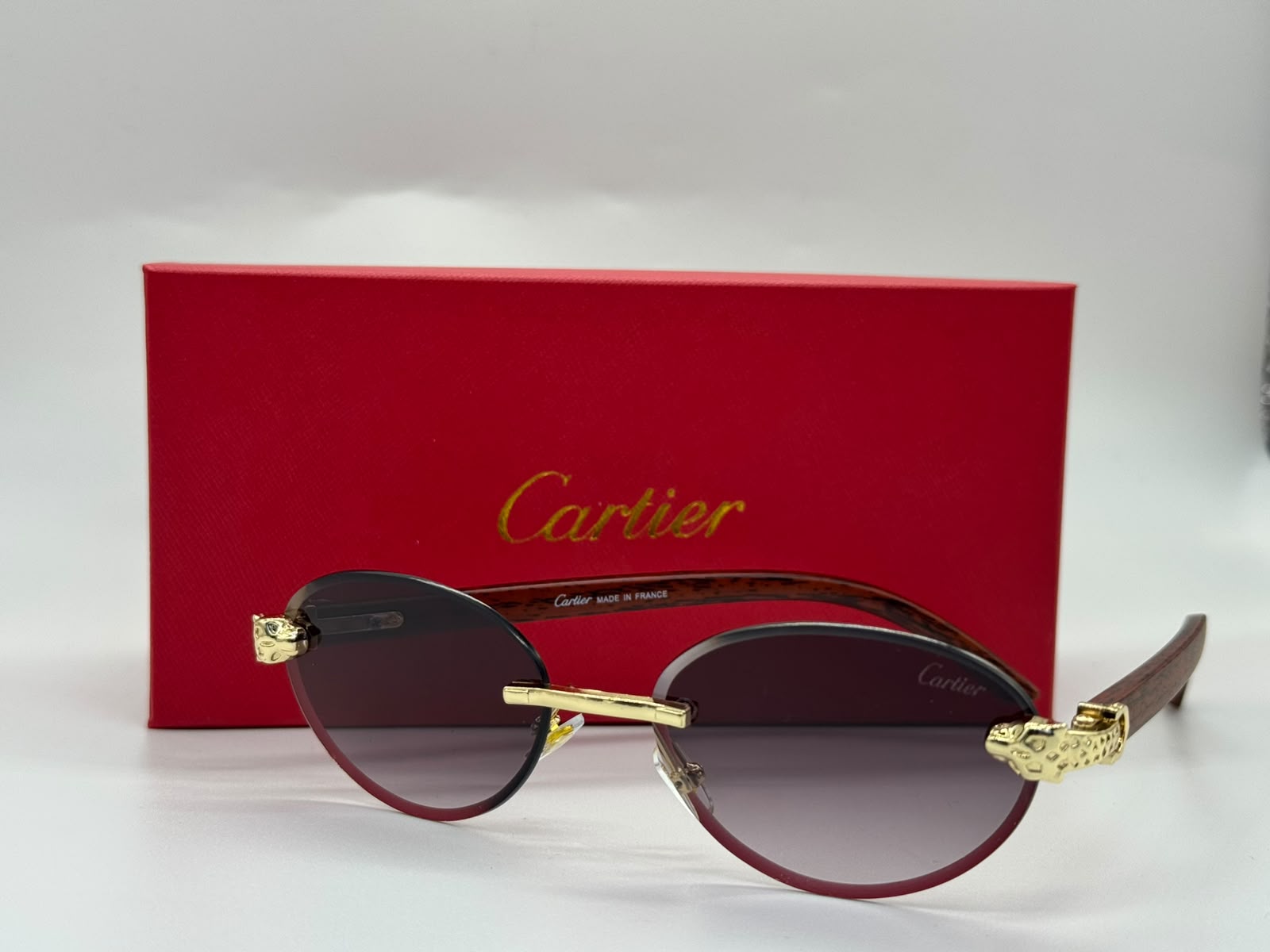 Cartier C Panthère de Cartier Rimless Sunglasses (Gold, Burgundy Gradient, and Bubinga Wood)