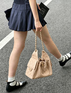 Chanel Small Quilted Drawstring Shopping Bag (Beige Caviar Calfskin)