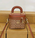 Coach Trail Vanity Case in Signature Canvas (Tan / Rust)