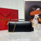 Valentino Garavani Locò Shoulder Bag (Black)
