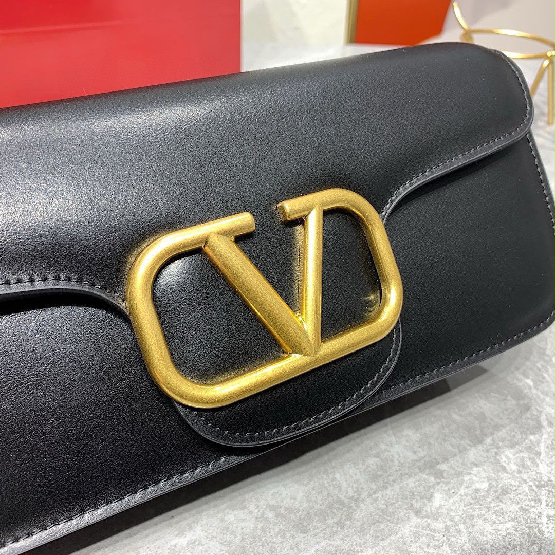 Valentino Garavani Locò Shoulder Bag (Black)