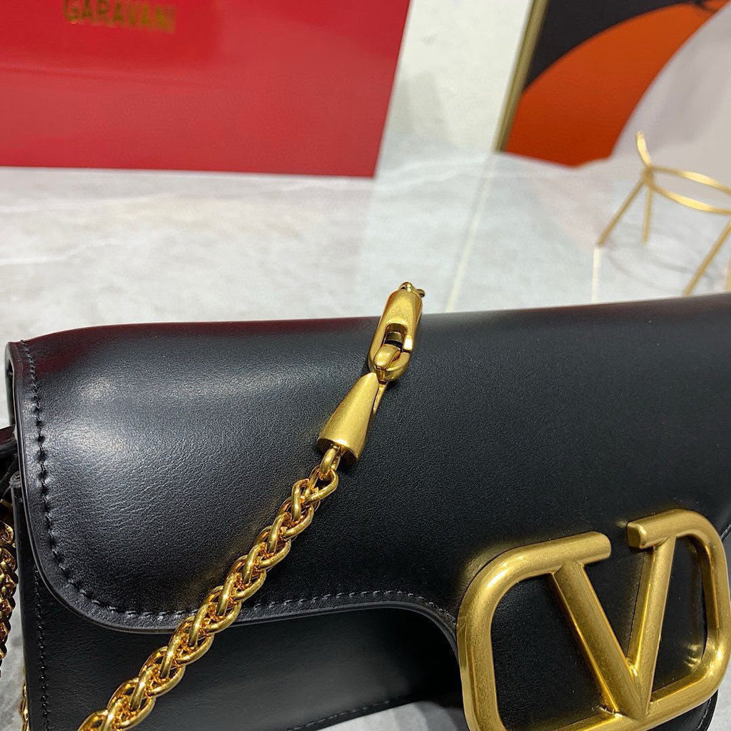 Valentino Garavani Locò Shoulder Bag (Black)