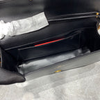 Valentino Garavani Locò Shoulder Bag (Black)