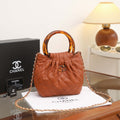 Chanel Small Quilted Hono Bucket Bag with Resin Handles (Brown / Caramel)