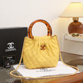 Chanel Small Quilted Hono Bucket Bag with Resin Handles (Yellow)