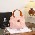 Chanel Small Quilted Hono Bucket Bag with Resin Handles (Light Pink)