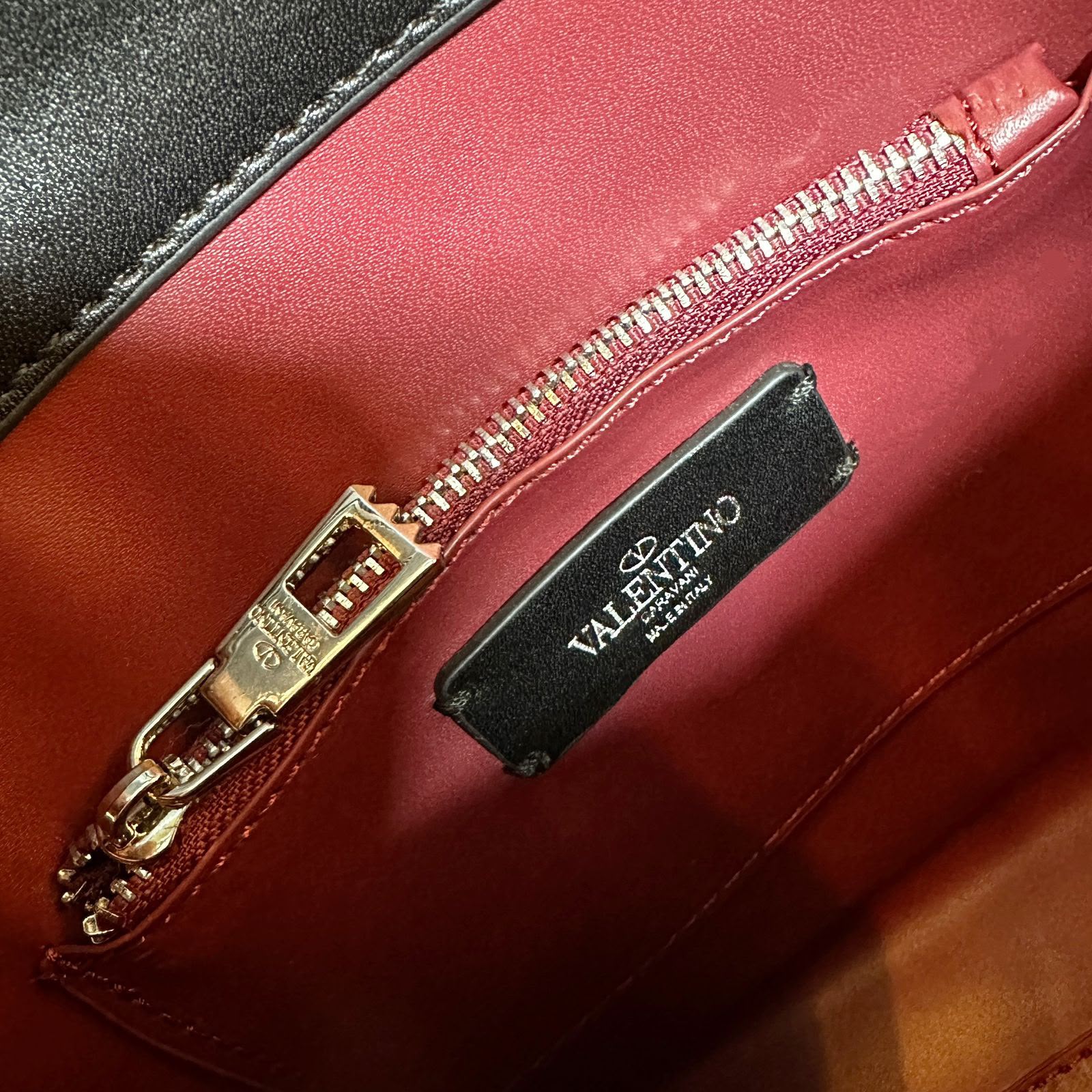 Valentino Garavani Locò Small Leather Top Handle Bag with Crystal VLogo