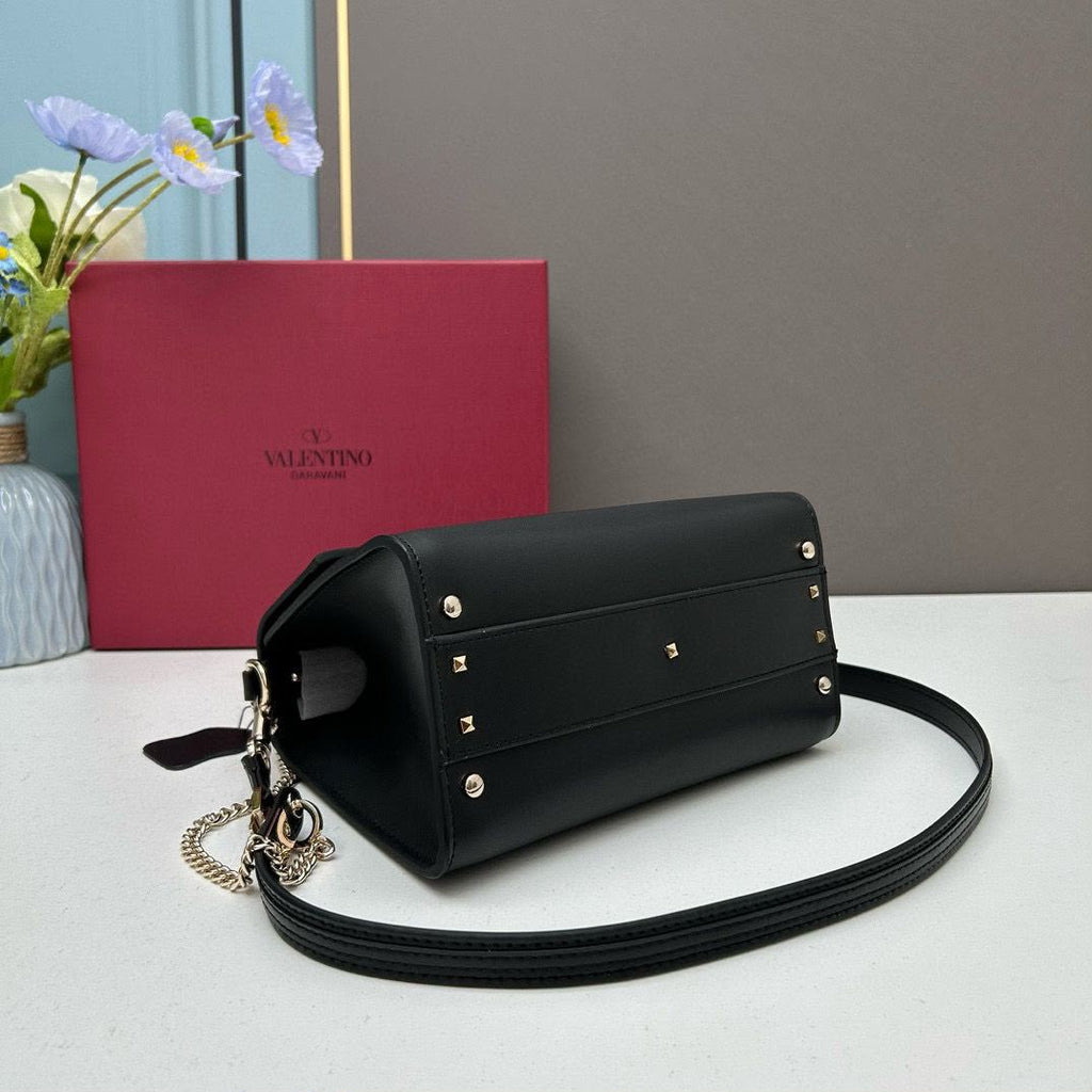 Valentino Garavani Locò Small Leather Top Handle Bag with Crystal VLogo