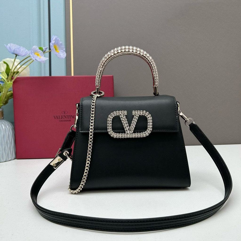 Valentino Garavani Locò Small Leather Top Handle Bag with Crystal VLogo