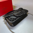 Valentino Garavani Locò Crystal-Embellished Leather Shoulder Bag (Black)
