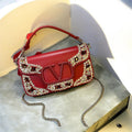 Valentino Garavani Locò Crystal-Embellished Leather Shoulder Bag (Red)
